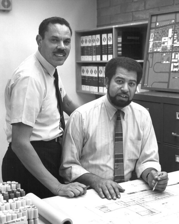 Left to right, Robert Kennard, and Arthur Silvers in their offices [circa 1960’s] on Washington Blvd.
