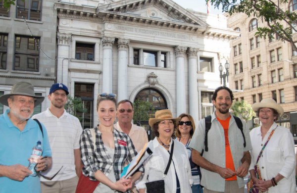Group of walking tourgoers in downtown los angeles.