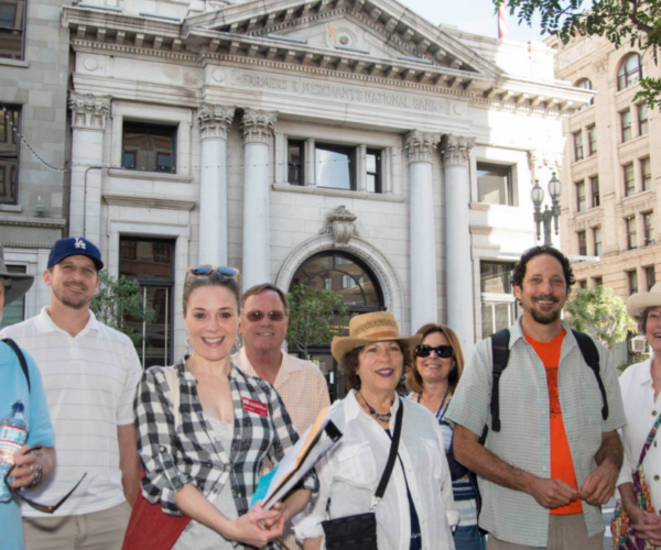Group of walking tourgoers in downtown los angeles.