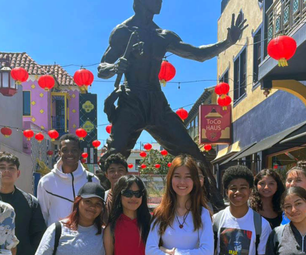 Heritage Project Students in front of the Bruce Lee statue in Chinatown.