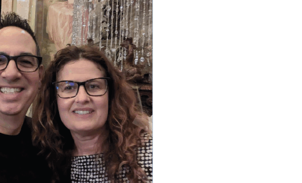 headshot of man and woman smiling