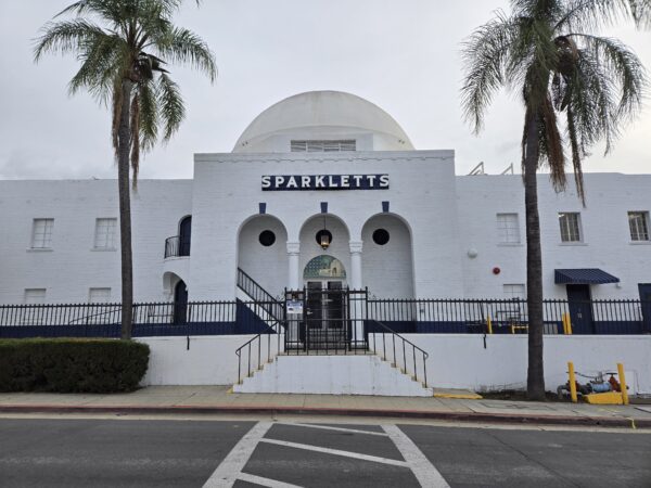 The view of the main entry portico and dome of the Sparkletts Bottling Plant