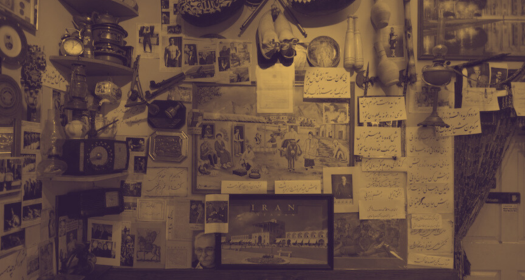 Wall of papers, shoes, clocks