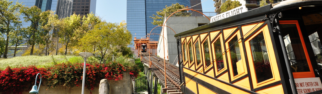 Orange car ascending track.