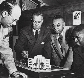 Paul R. Williams, center, with the model for the Golden State Mutual Life Insurance Building.