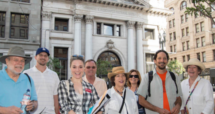 Group of walking tourgoers in downtown los angeles.