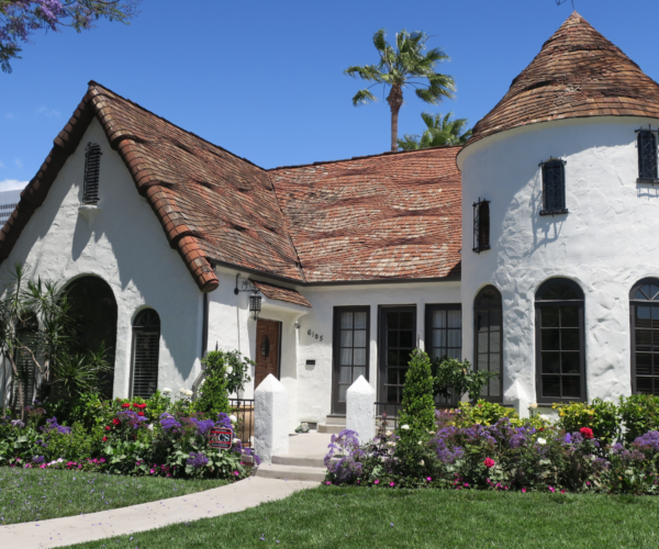 White cottage-style house located in Carthay Historic Neighborhood District.