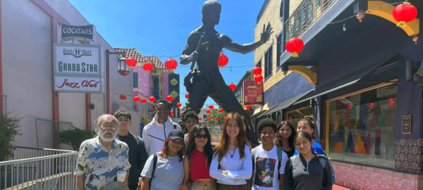 Heritage Project Students in front of the Bruce Lee statue in Chinatown.