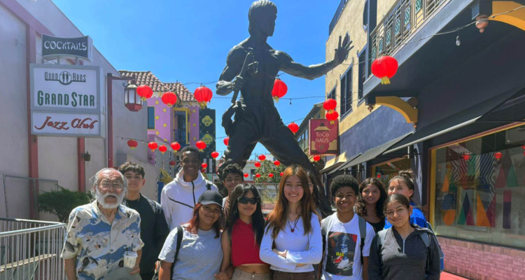Heritage Project Students in front of the Bruce Lee statue in Chinatown.