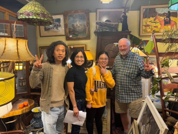 Students Jue (Emma) Wang, Xiaoling (Eleei) Yu, and Shanguo (Sam) Jia and owner Dennis Haupt