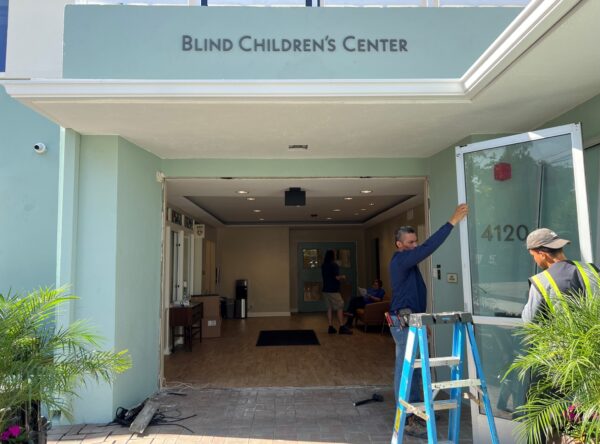 Removal of front door of Blind Children's Center