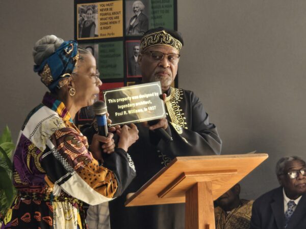 Congregants of NCMBC display a plaques that reads: