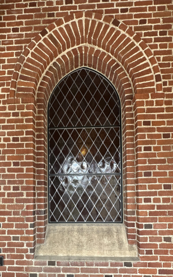 Exterior stained-glass window after repair.