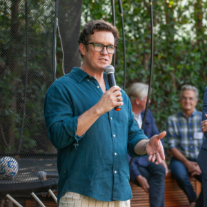 man speaking into microphone