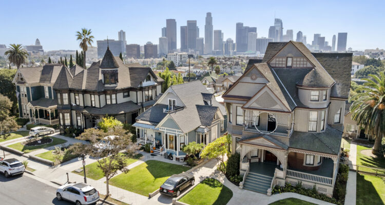 The south side of Carroll Avenue as seen from drone, with the DTLA skyline in the background.