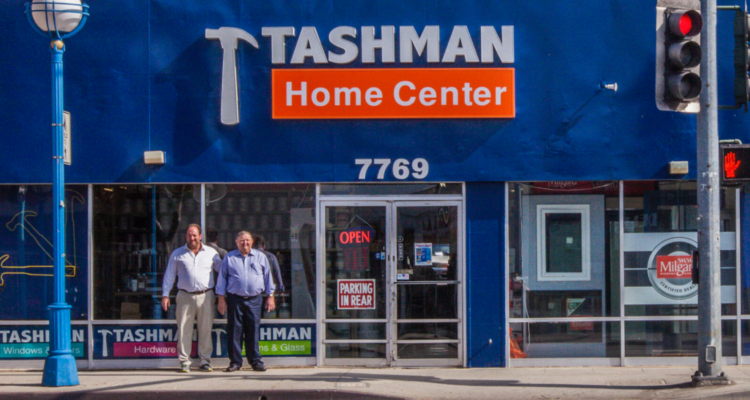 Mark and Kenny Tashman at Tashman Home Center storefront, 2026.